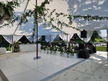 Dance floor over white flooring on stage